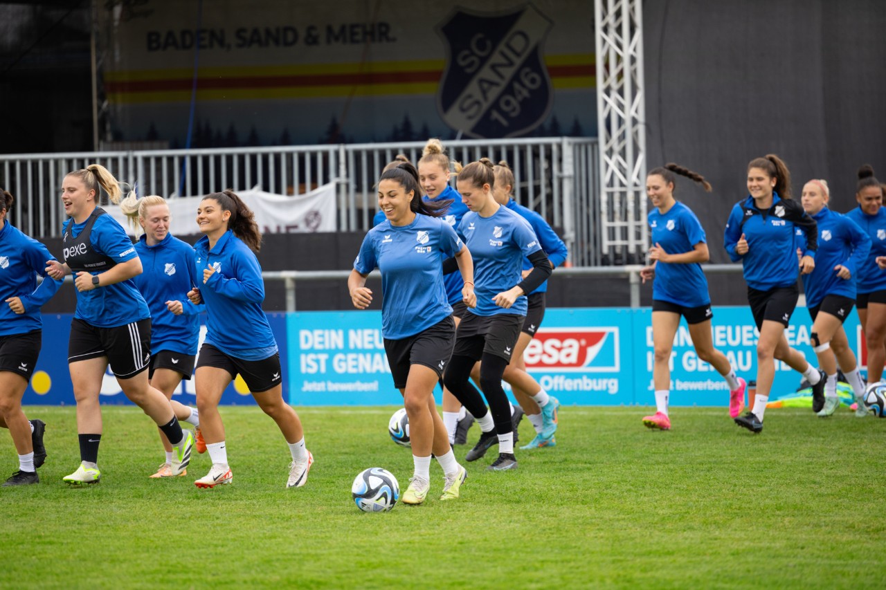 Female footballers training
